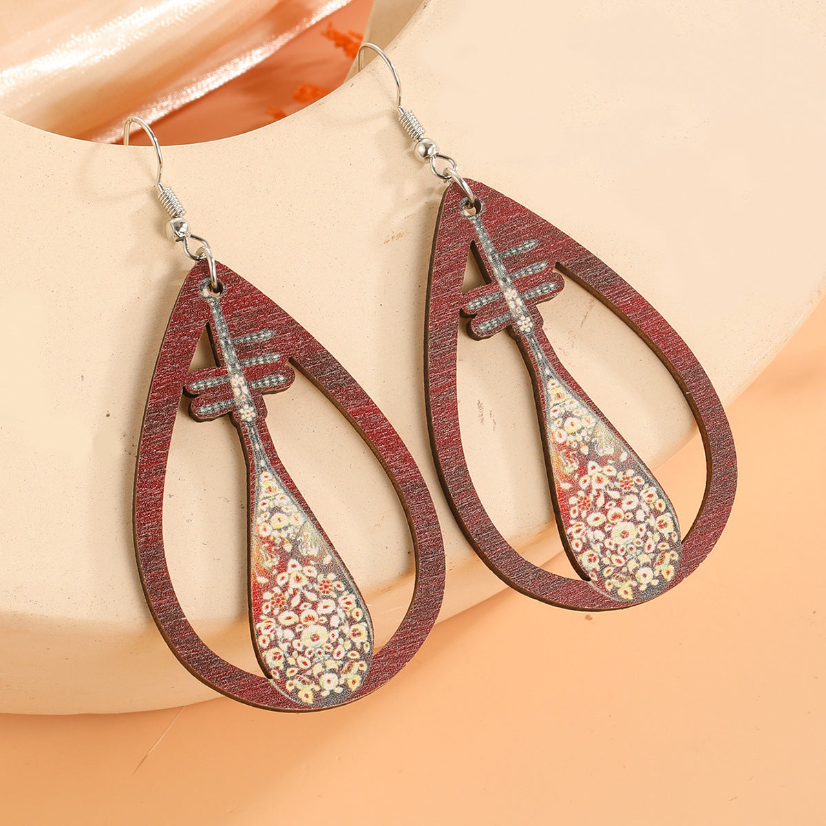 Guitarra de agua de agua al por mayor arpa acordeón estampado de madera aretes de madera